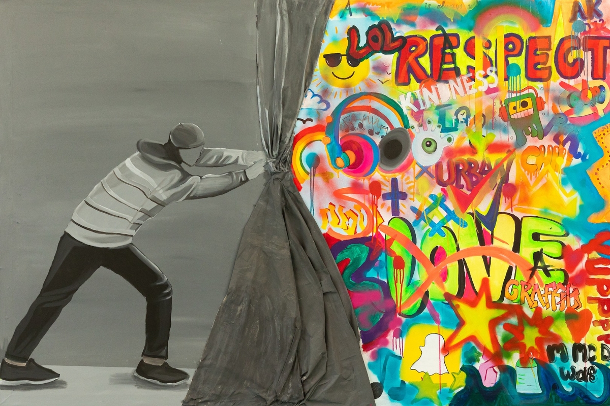young person revealing a wall of colour